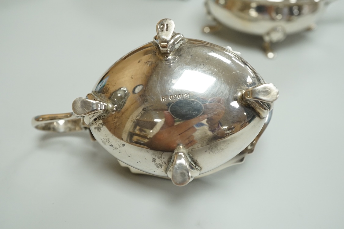 A George V eight piece silver cruet set by Walker & Hall, Birmingham, 1923, lacking spoons.
